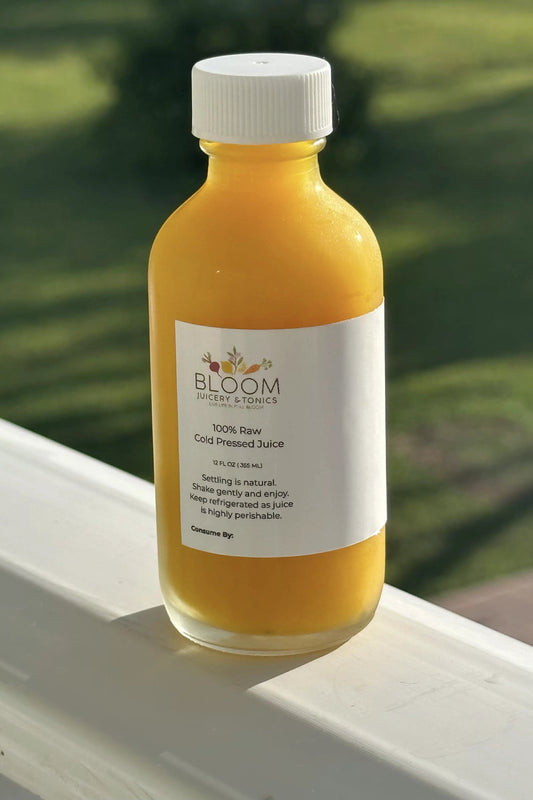 Orange juice in a glass bottle